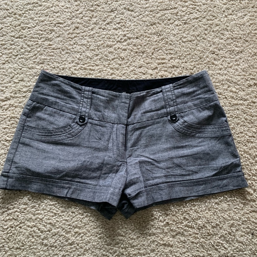 Guess shorts in grey.
